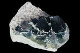 Cubic, Blue-Green Fluorite Crystals on Quartz - China #128555-1